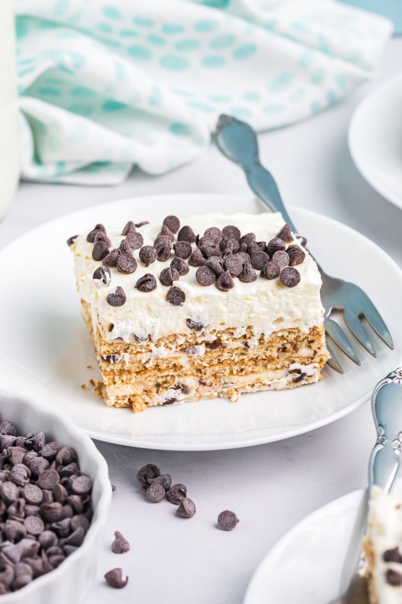 a slice of cannoli icebox cake on a white plate