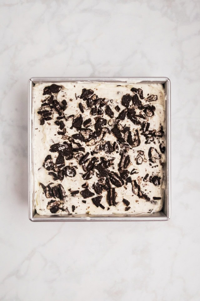 overhead view of Oreo cheesecake bars ready to be chilled
