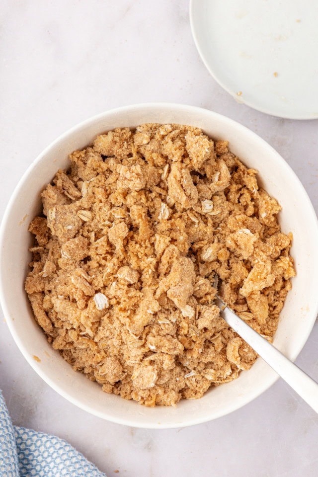 overhead view of crumb topping mixture in a white bowl