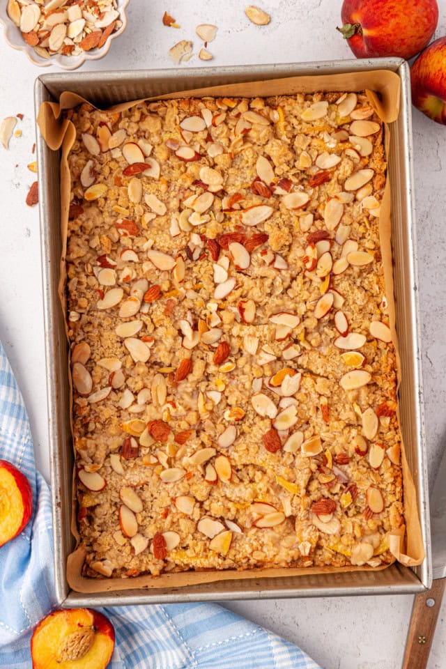 overhead view of freshly baked peach bars in a rectangular pan