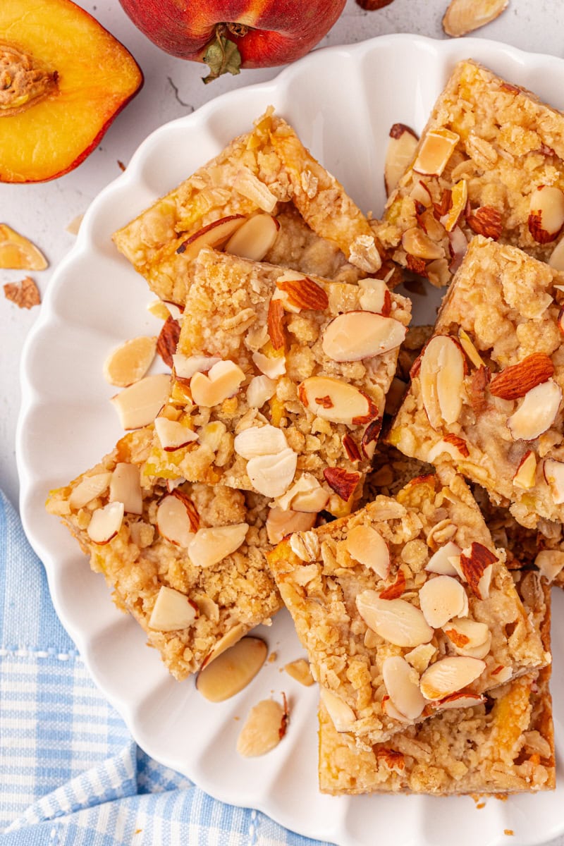 overhead view of several peach bars on a white plate