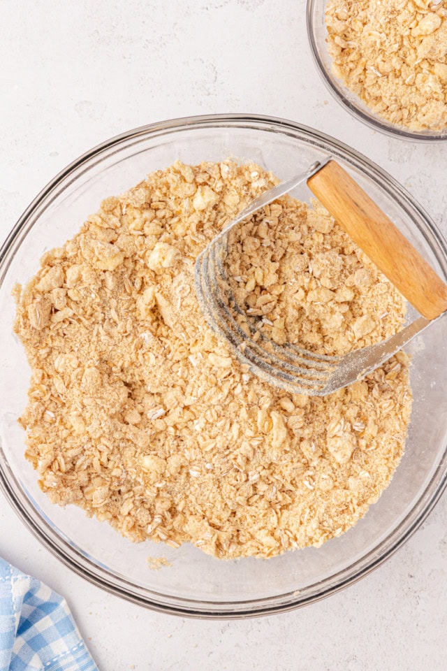 overhead view of mixed crust and crumb topping for peach bars