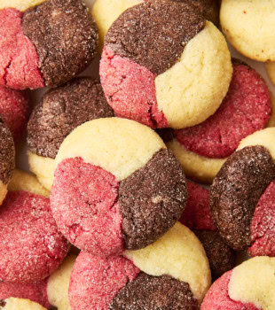 overhead view of several Neapolitan cookies piled together