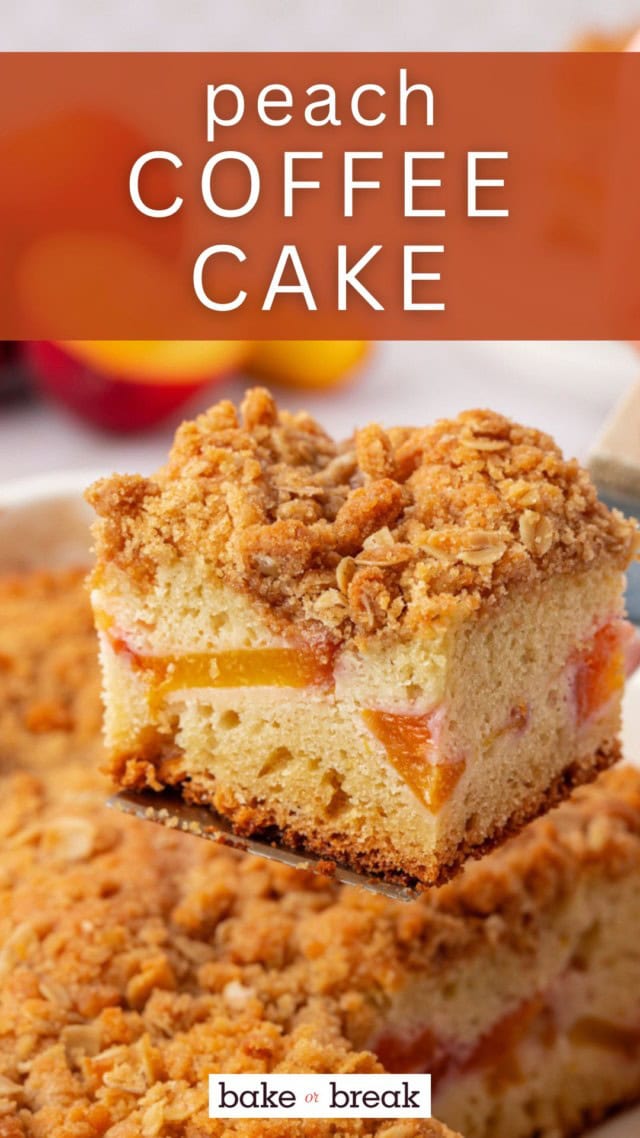 a slice of peach coffee cake on a spatula with the remaining cake in the background