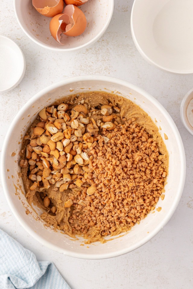 overhead view of nuts and toffee bits added to blondie batter