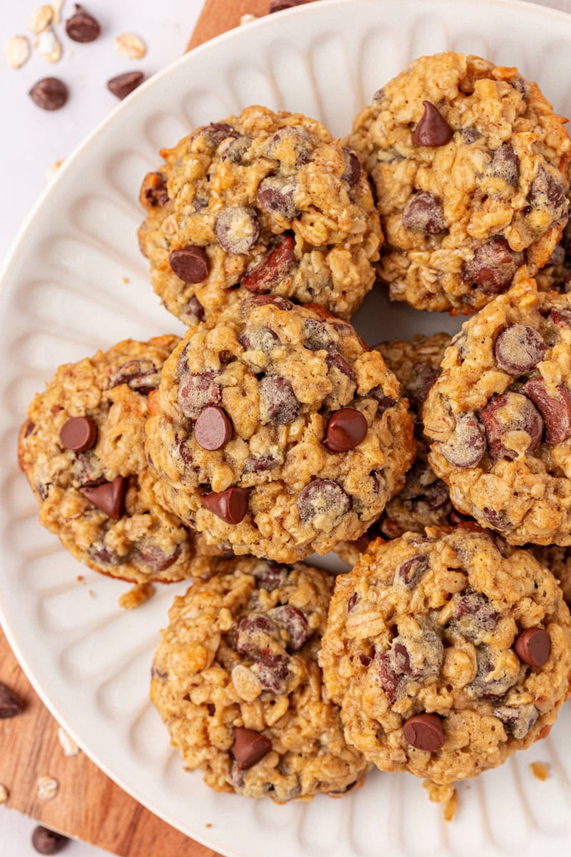 overhead view of brown sugar oatmeal chocolate chip cookies on a white plate