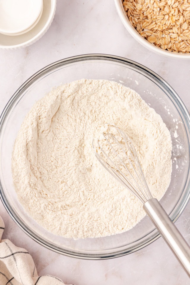 overhead view of mixed dry ingredients for oatmeal chocolate chip cookies