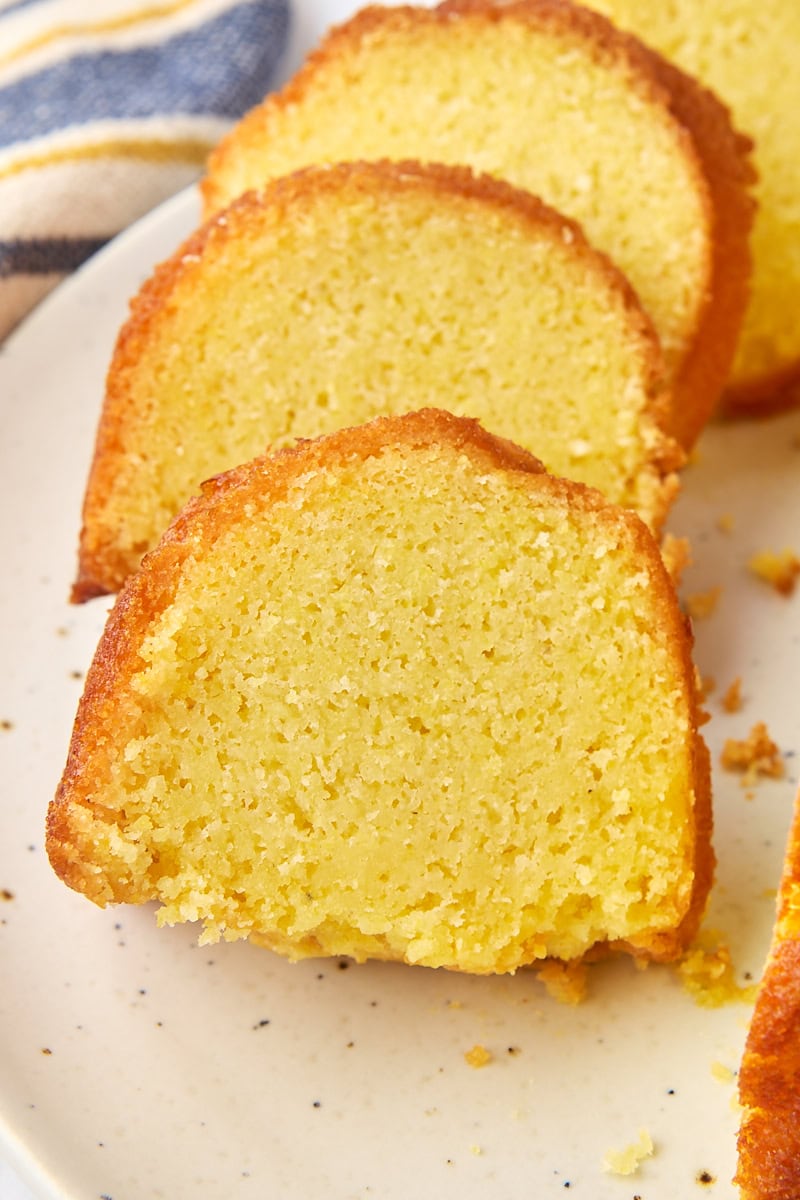 slices of cornmeal pound cake on a white cake plate