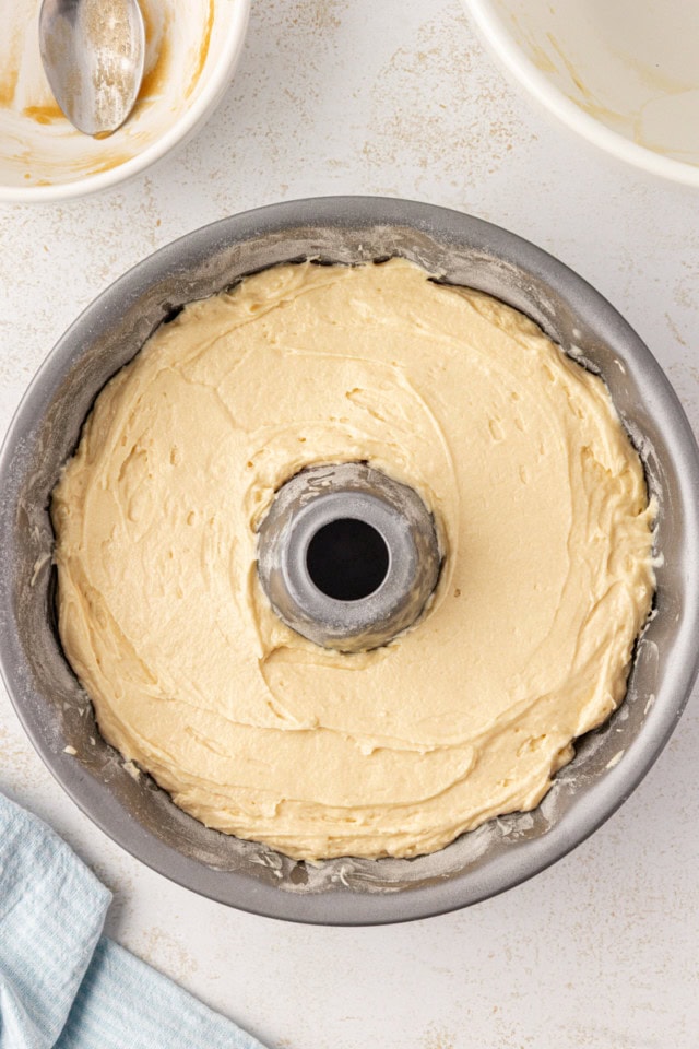 overhead view of caramel swirl Bundt cake in a Bundt pan ready to go into the oven