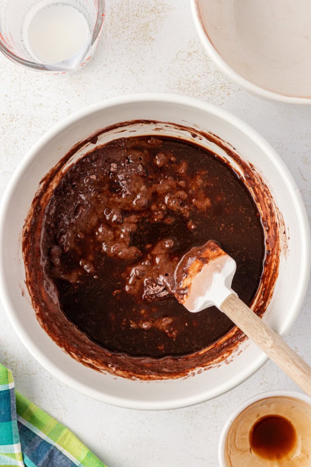 overhead view of coffee added to chocolate cupcake batter