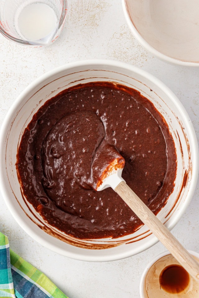 overhead view of chocolate cupcake batter in a white bowl