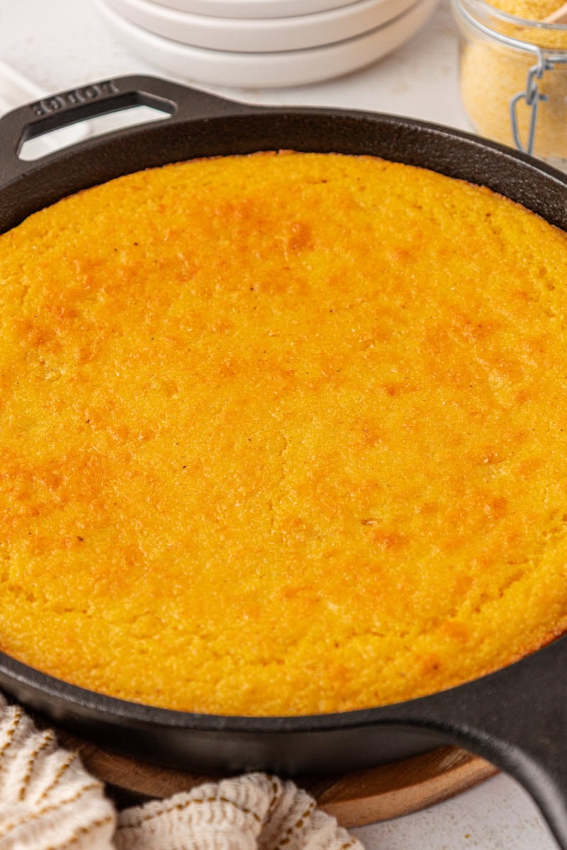 sour cream corn bread in a cast iron skillet