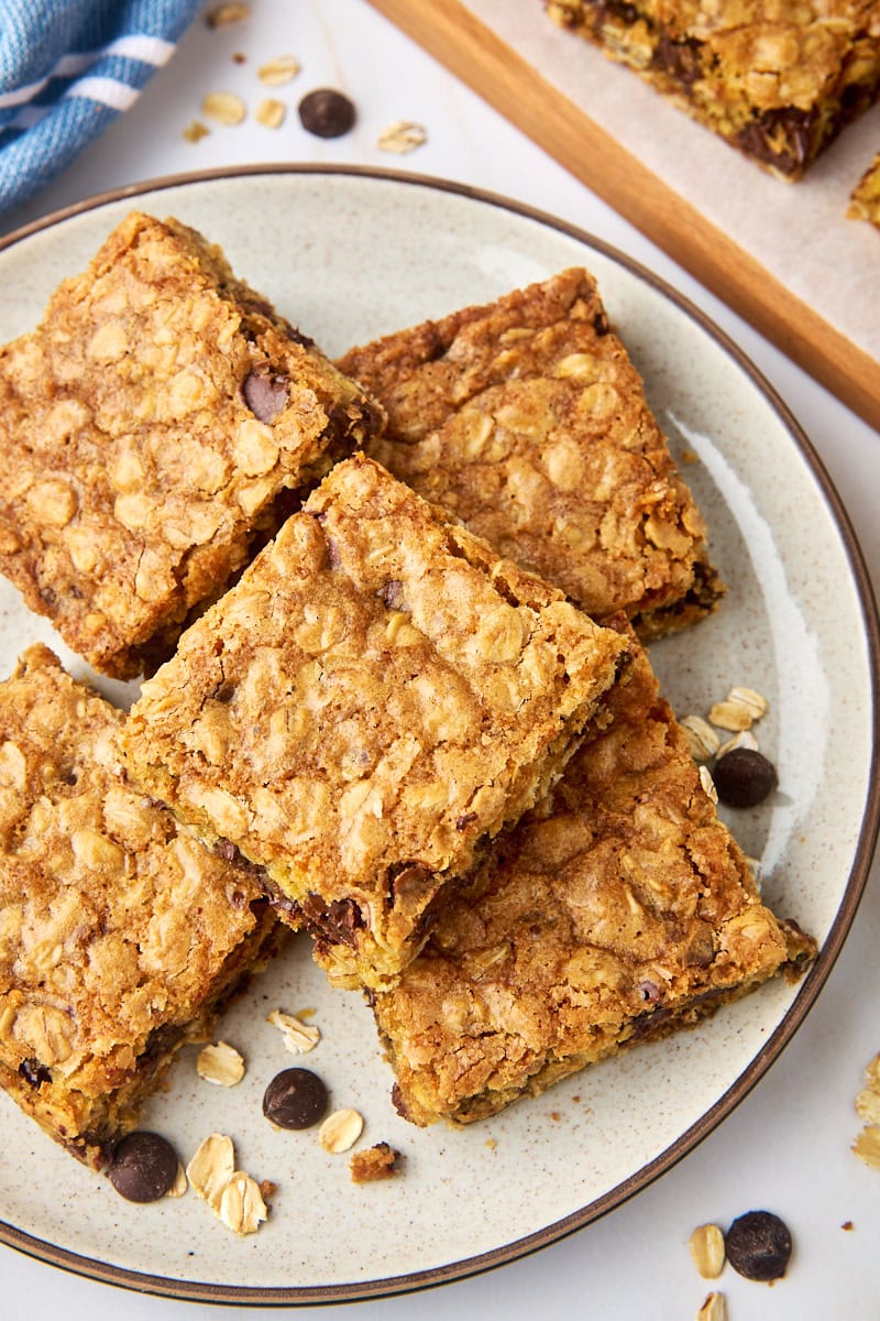 overhead view of oatmeal cookie bars in a stacked pile on a plate