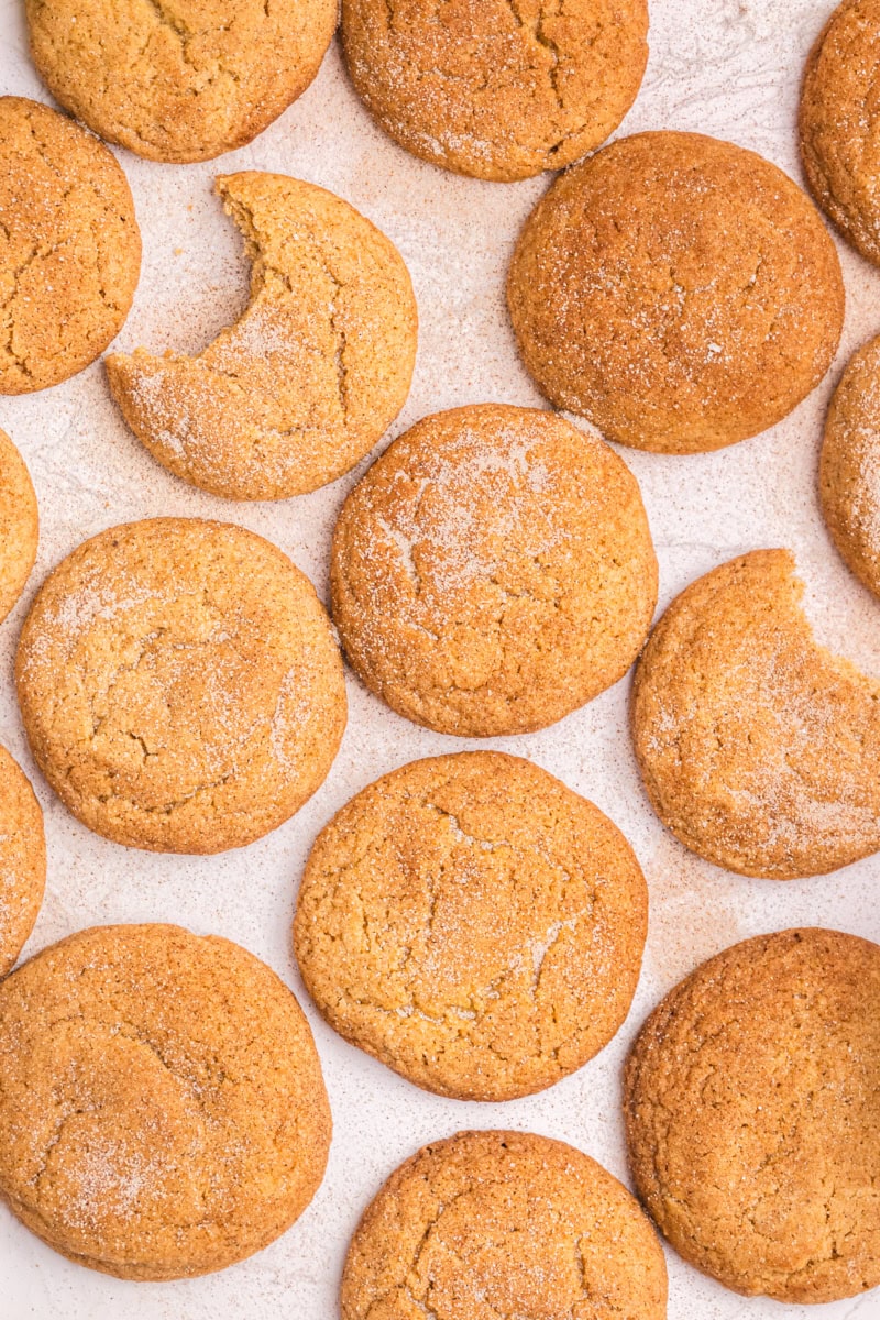 overhead view of apple butter snickerdoodles on a white surface