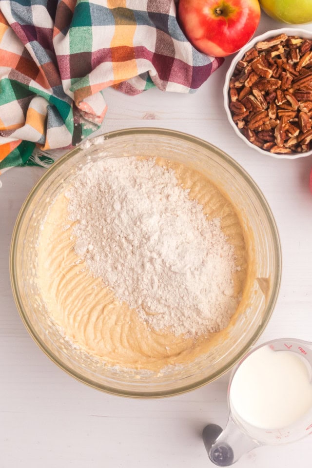 overhead view of dry ingredients added to cake batter