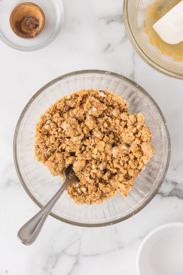 overhead view of caramel crumb topping in a glass bowl