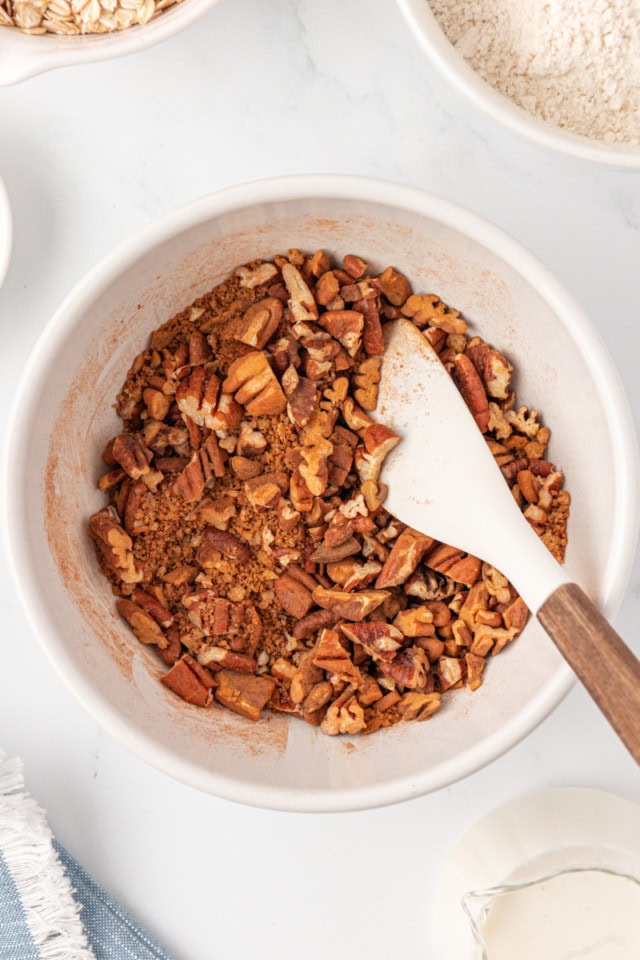 overhead view of nutty cinnamon swirl mixture for scones in a white bowl