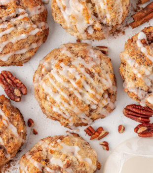 overhead view of cinnamon bun scones on a white surface
