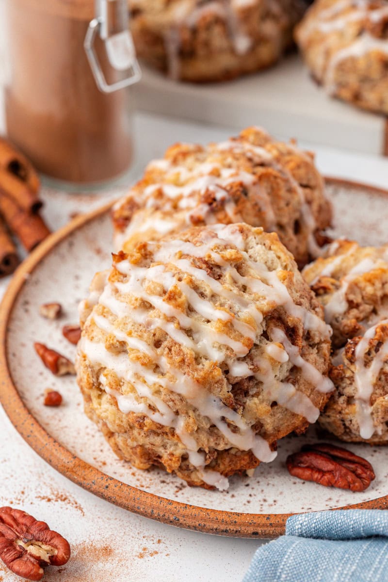three cinnamon bun scones on a plate
