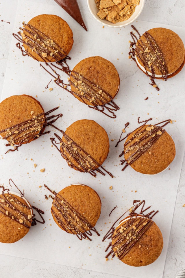 overhead view of s'mores whoopie pies on a white surface