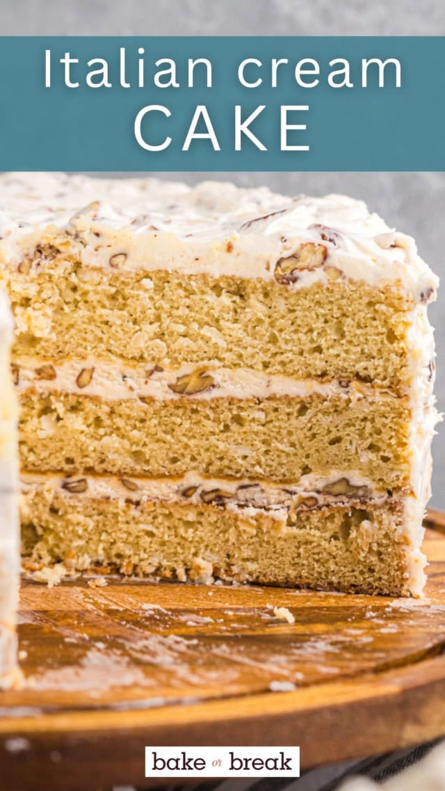 close-up of a cross-section of Italian cream cake on a wooden cake stand; text overlay "Italian cream cake bake or break"