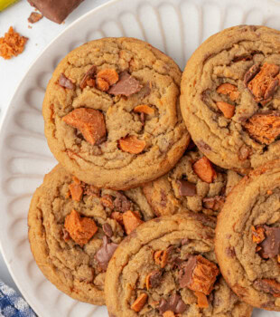 overhead view of Butterfinger cookies on a white plate