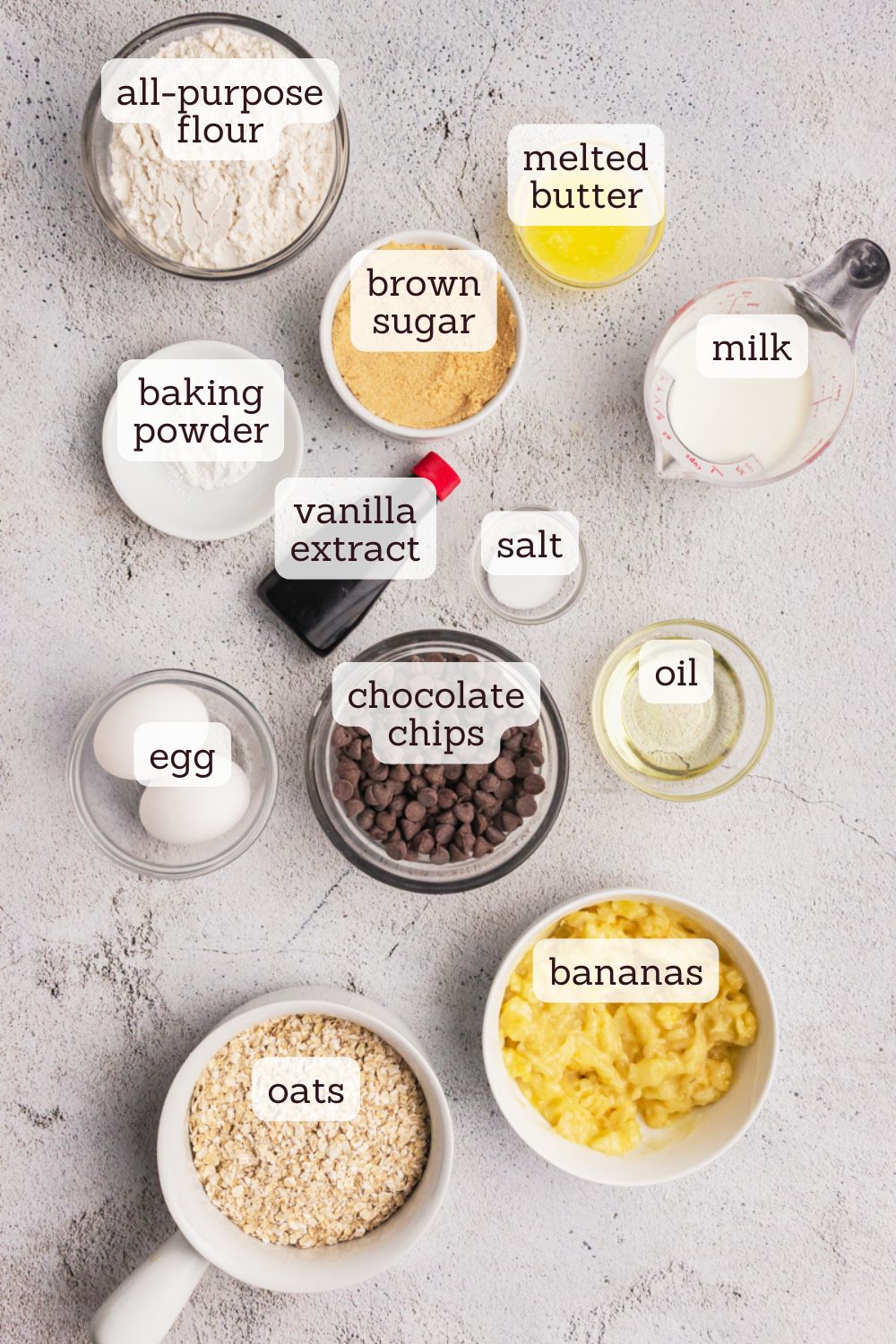 overhead view of ingredients for banana oatmeal chocolate chip muffins