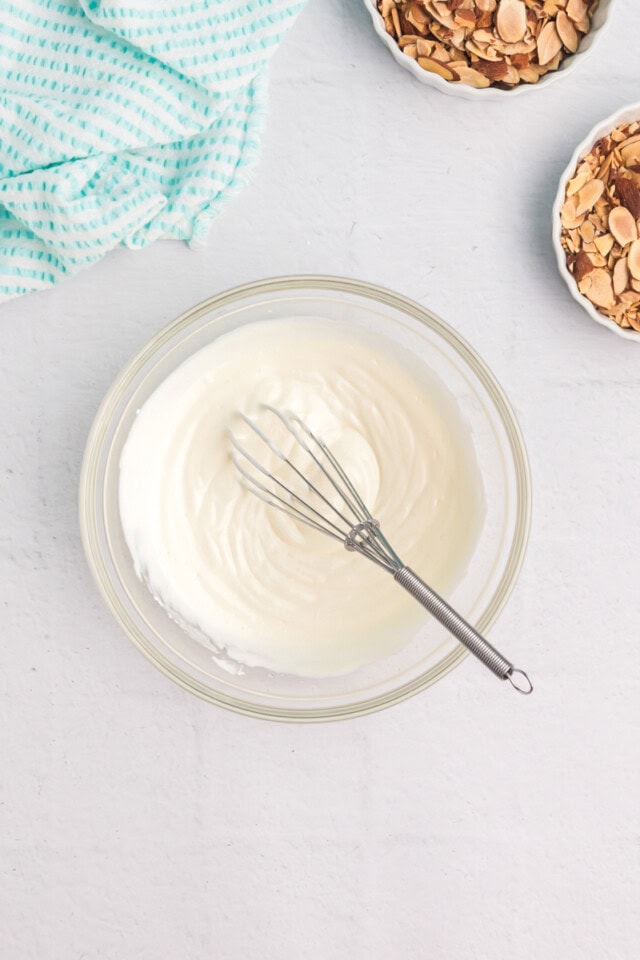 overhead view of sour cream glaze in a small glass bowl