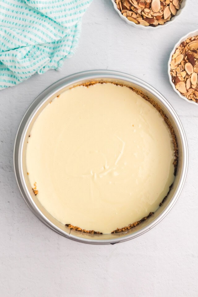 overhead view of amaretto cheesecake in a springform pan ready to go into the oven
