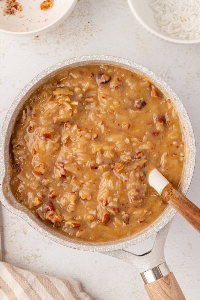 overhead view of coconut-pecan frosting in a saucepan