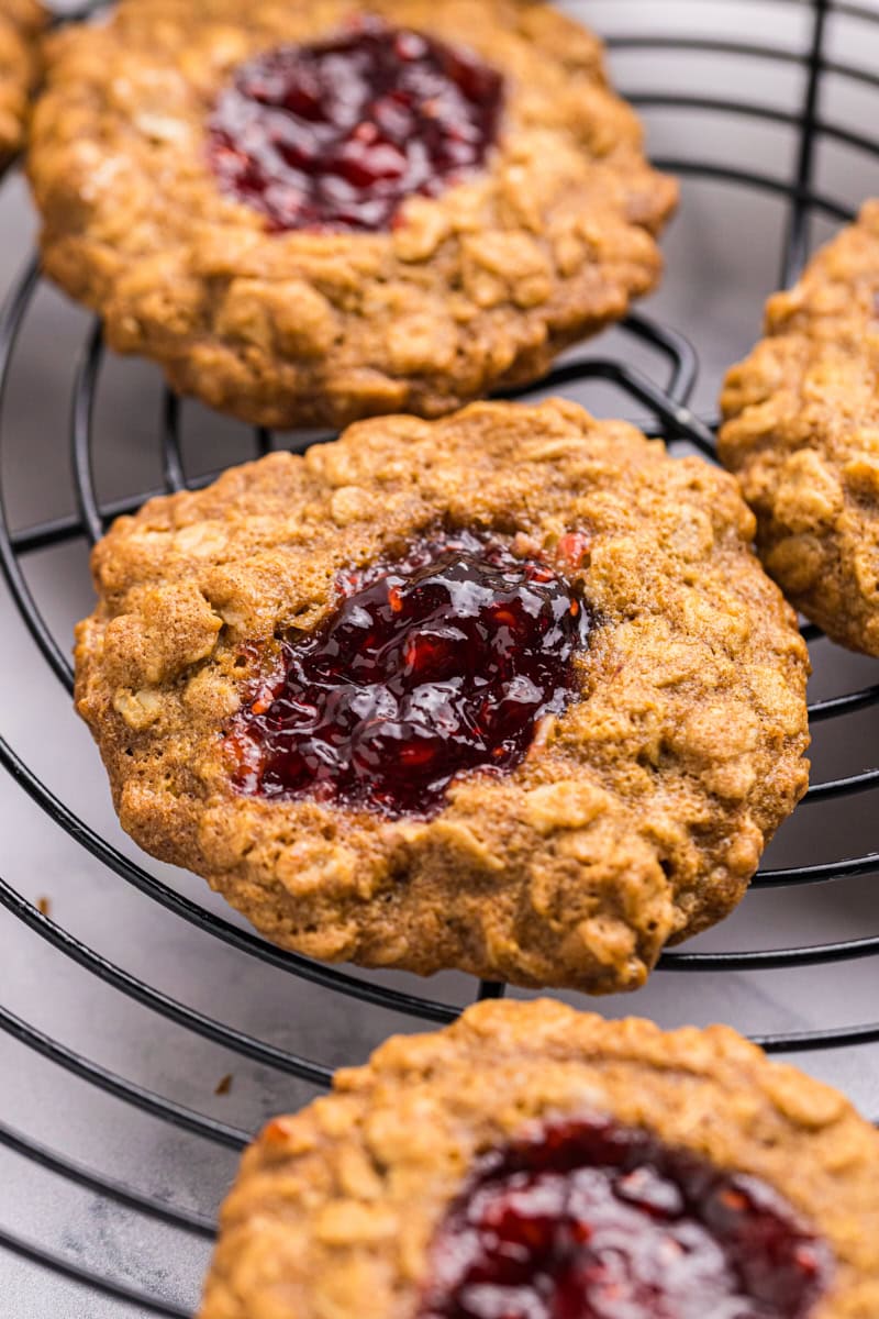 oatmeal thumbprint cookies cooling on a wire rack