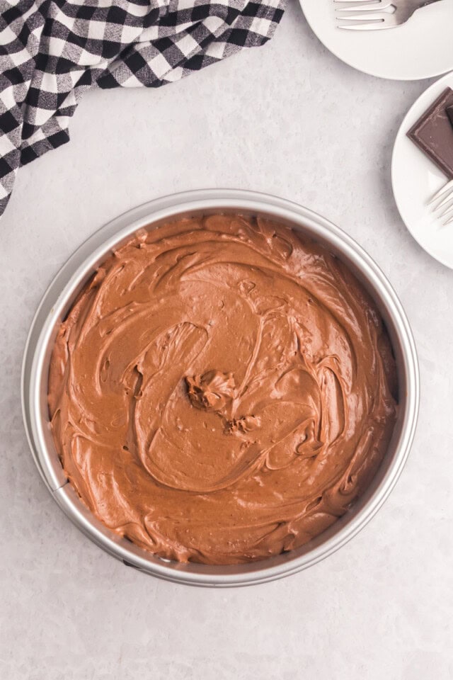 overhead view of chocolate cheesecake batter in a springform pan
