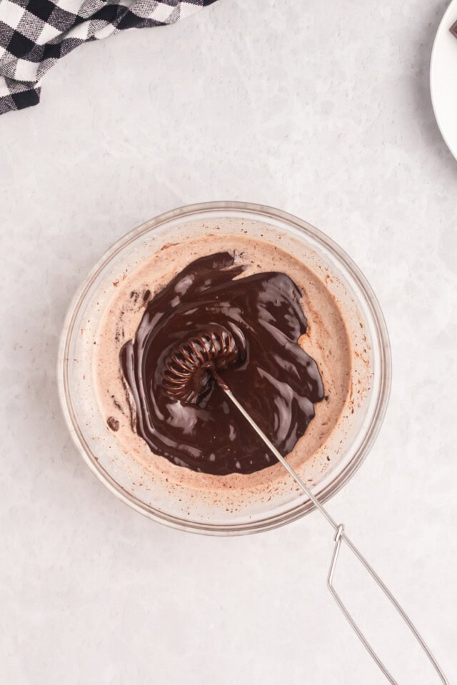 overhead view of chocolate ganache being stirred