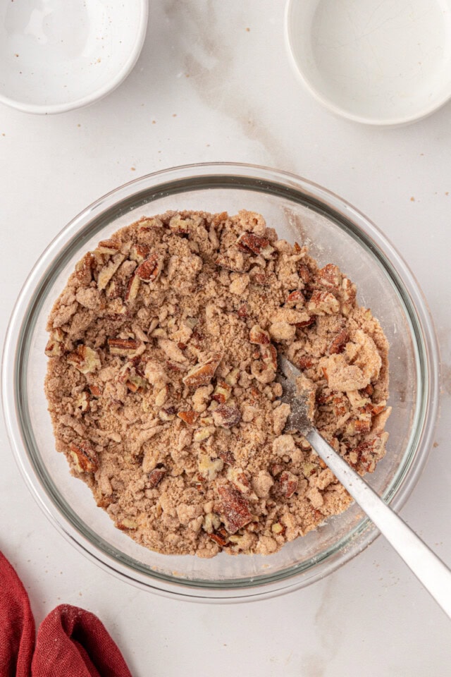 overhead view of streusel mixture in a glass bowl