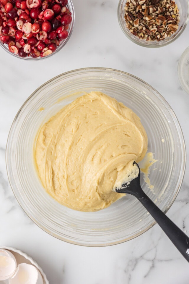 overhead view of mixed quick bread batter in a mixing bowl
