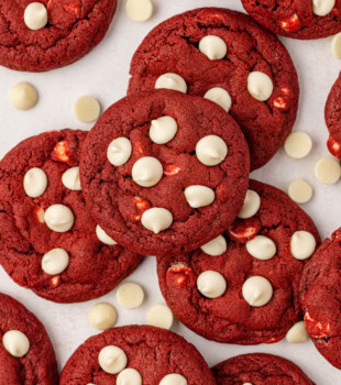 overhead view of red velvet cookies studded with white chocolate chips