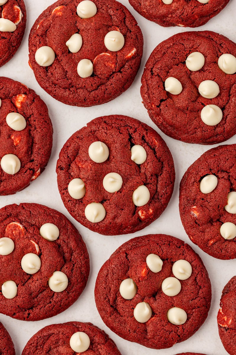 overhead view of red velvet cookies on a white surface