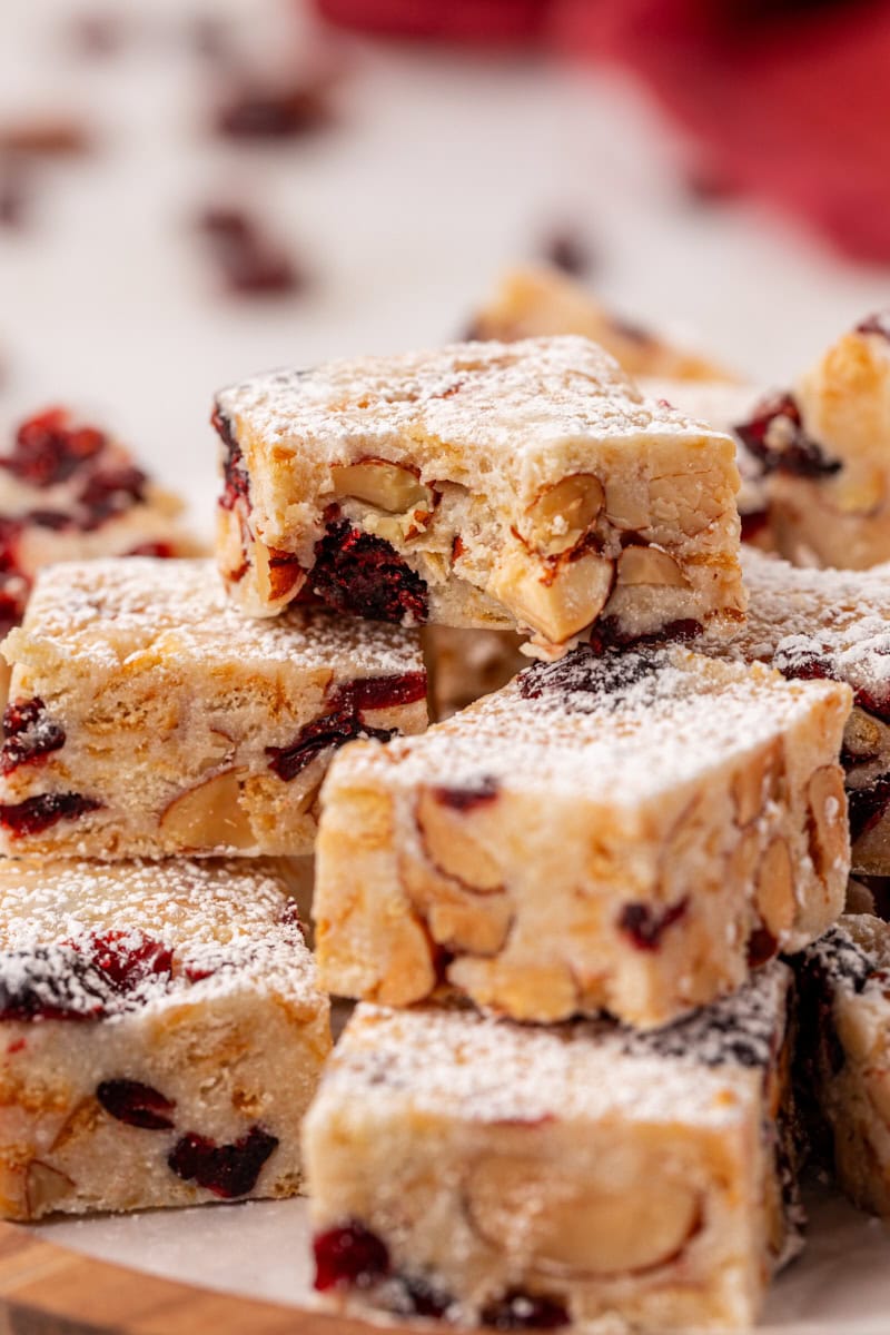close up of a small stack of snowflake crisp with a bite missing from the top piece