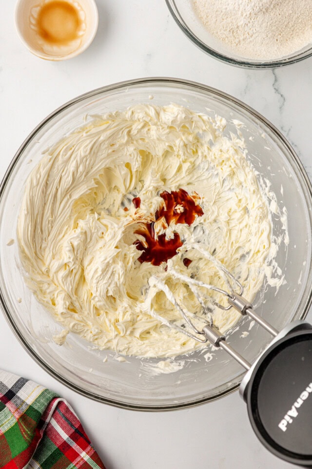 overhead view of vanilla extract added to shortbread mixture