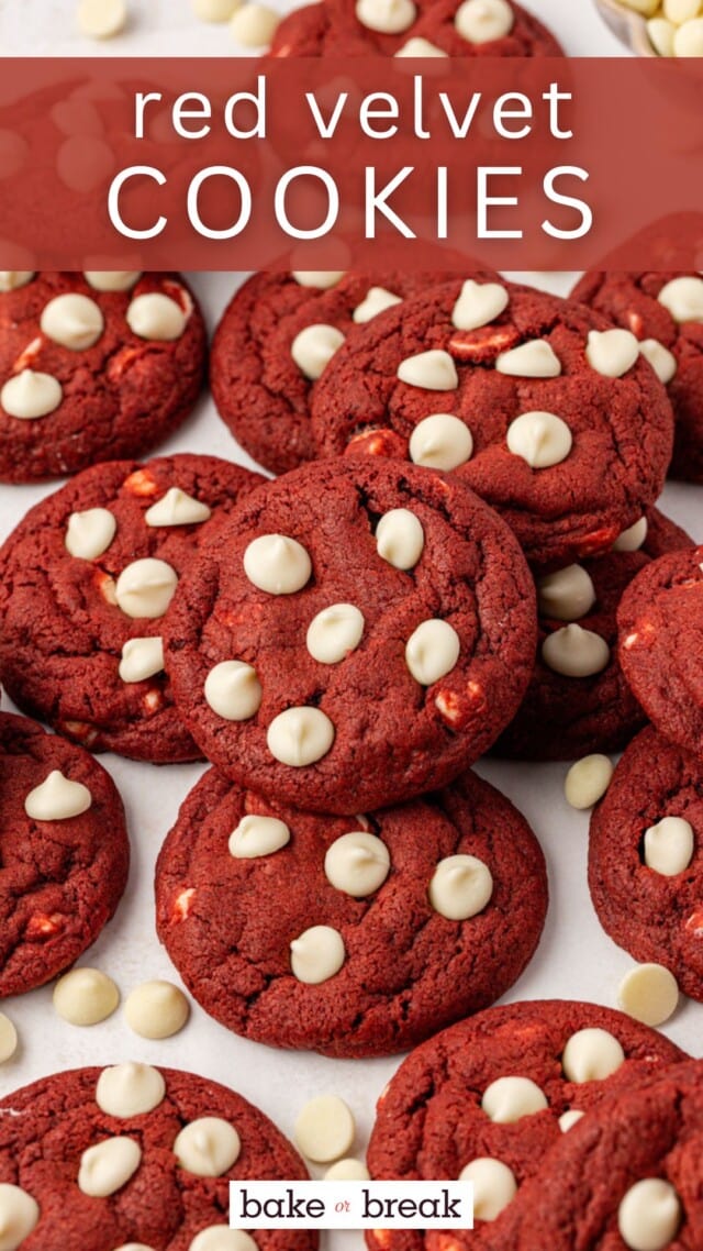 red velvet cookies studded with white chocolate chips scattered on a white surface; text overlay "red velvet cookies bake or break"