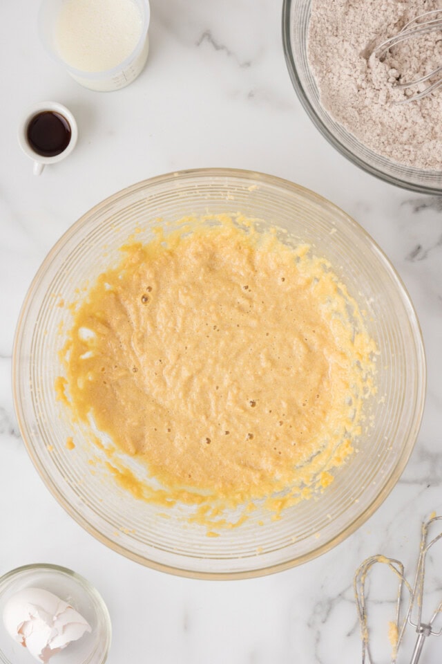 overhead view of partially mixed cinnamon sugar snack cake batter