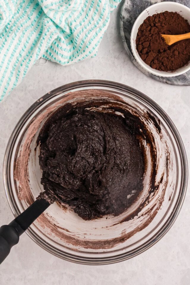 overhead view of mixed brownie batter in a bowl