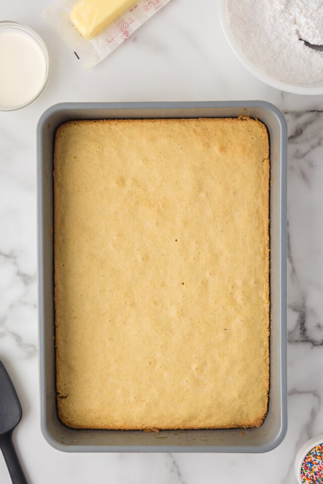 overhead view of freshly baked sugar cookie bars in a rectangular baking pan