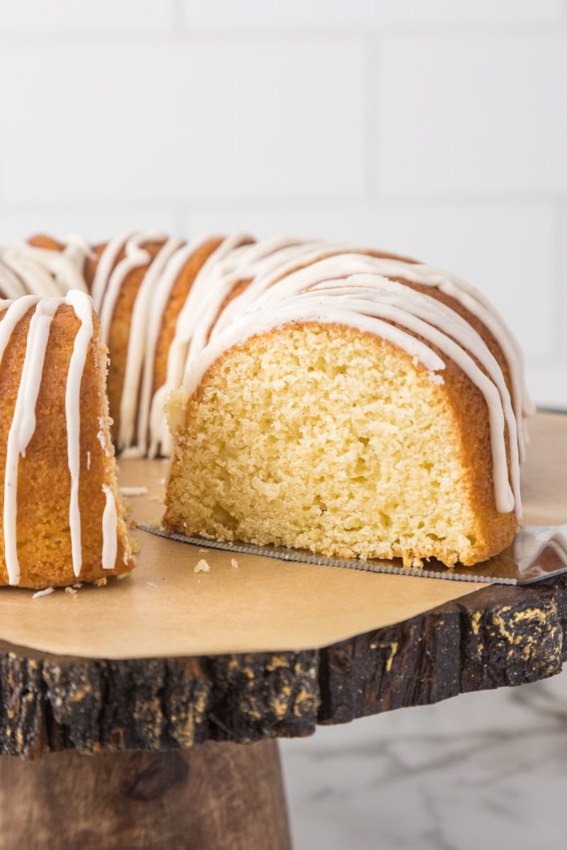 Sliced vanilla Bundt cake showing a light, tender crumb