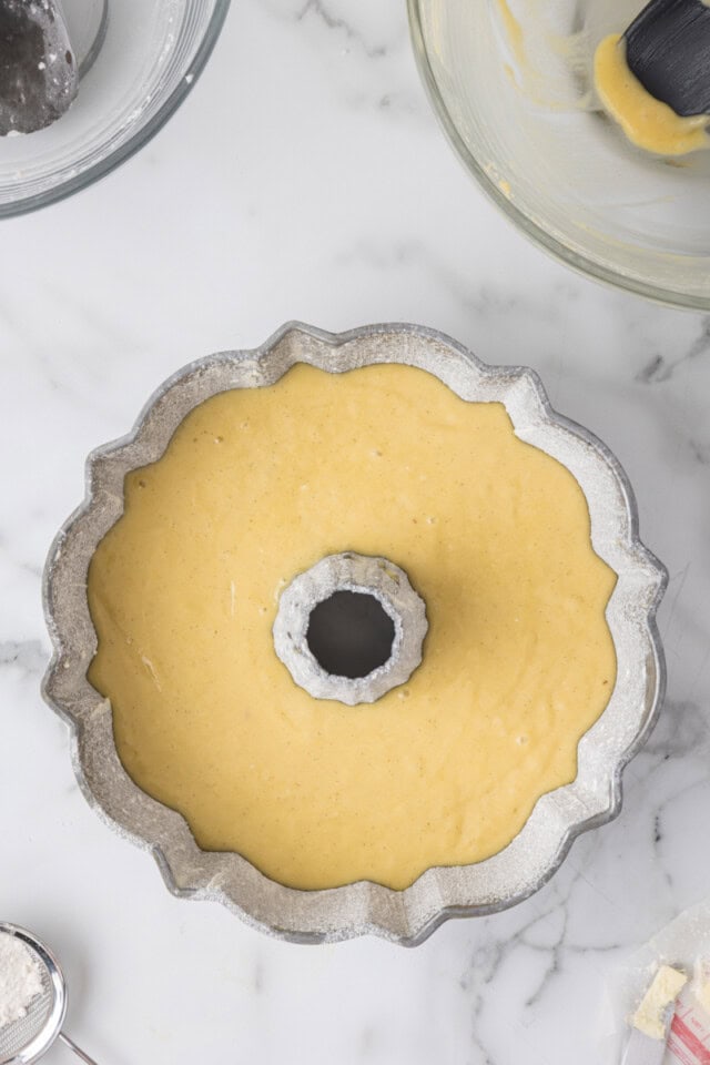overhead view of vanilla Bundt cake in a Bundt pan ready to go into the oven