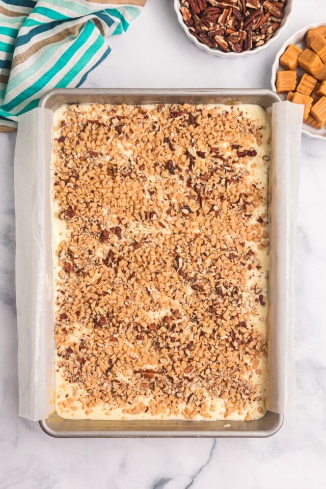 overhead view of caramel cheesecake bars assembled and ready to go into the oven