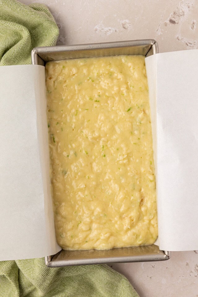 batter for coconut lime loaf cake in loaf pan before baking