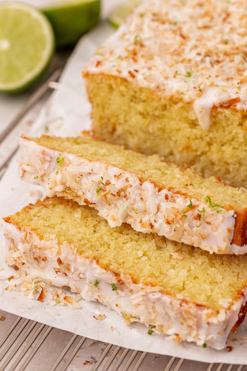 close-up of coconut lime loaf cake with shredded coconut throughout