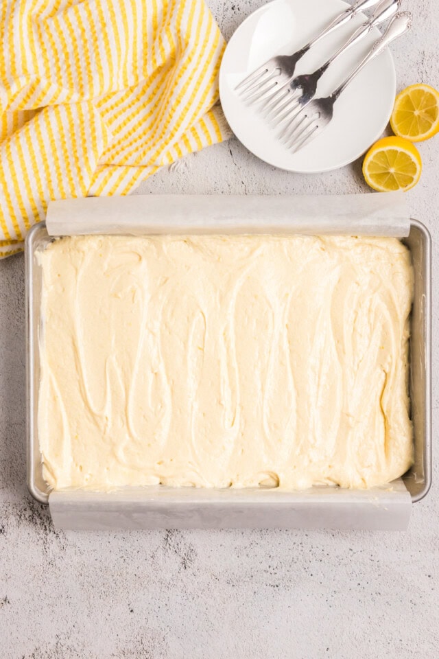 overhead view of lemon cake batter in a 9x13 baking pan