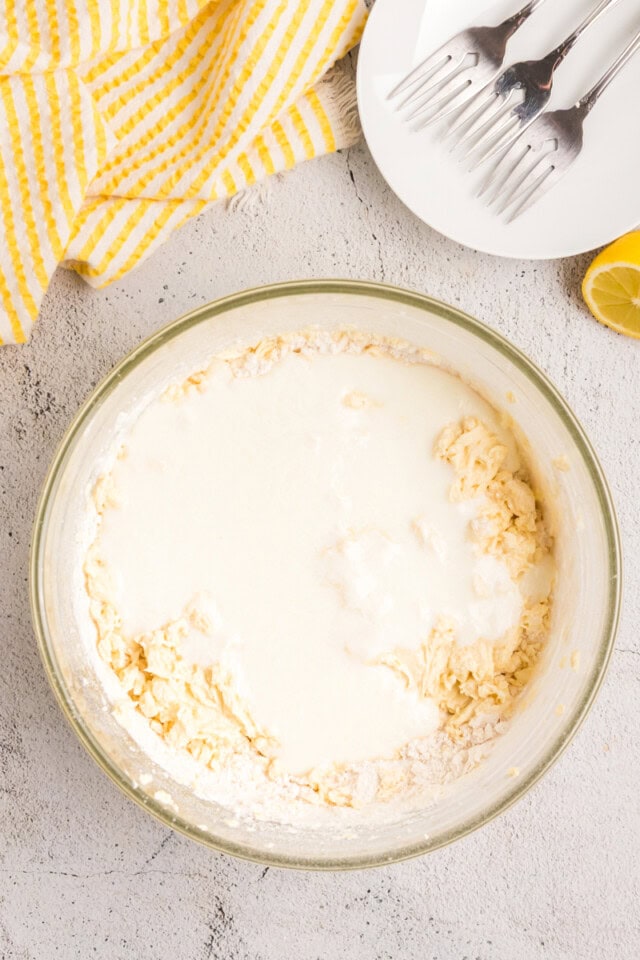overhead view of milk and lemon juice added to cake batter